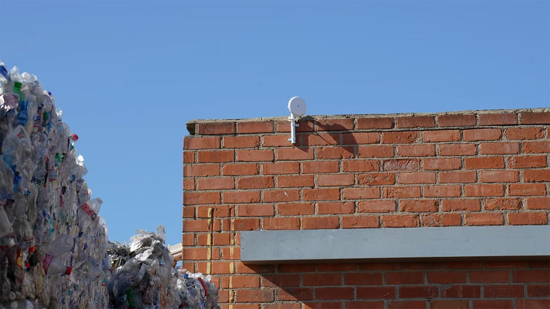 Ubiquiti UniFi Building-to-Building Bridge installed to wirelessly connect a remote scale house.