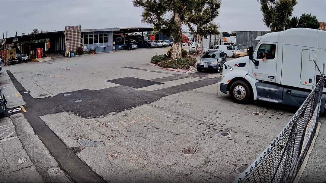 Commercial semi truck entering the yard captured by UniFi LPR camera for metadata extraction