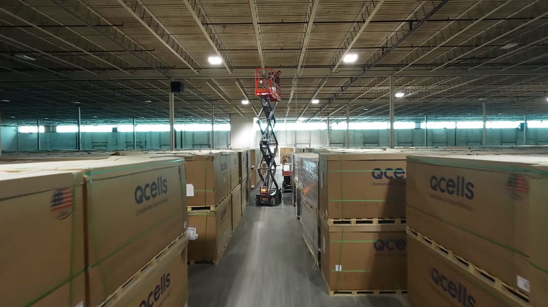 High-ceiling installation of a UniFi U7 Pro AP using an industrial scissor lift