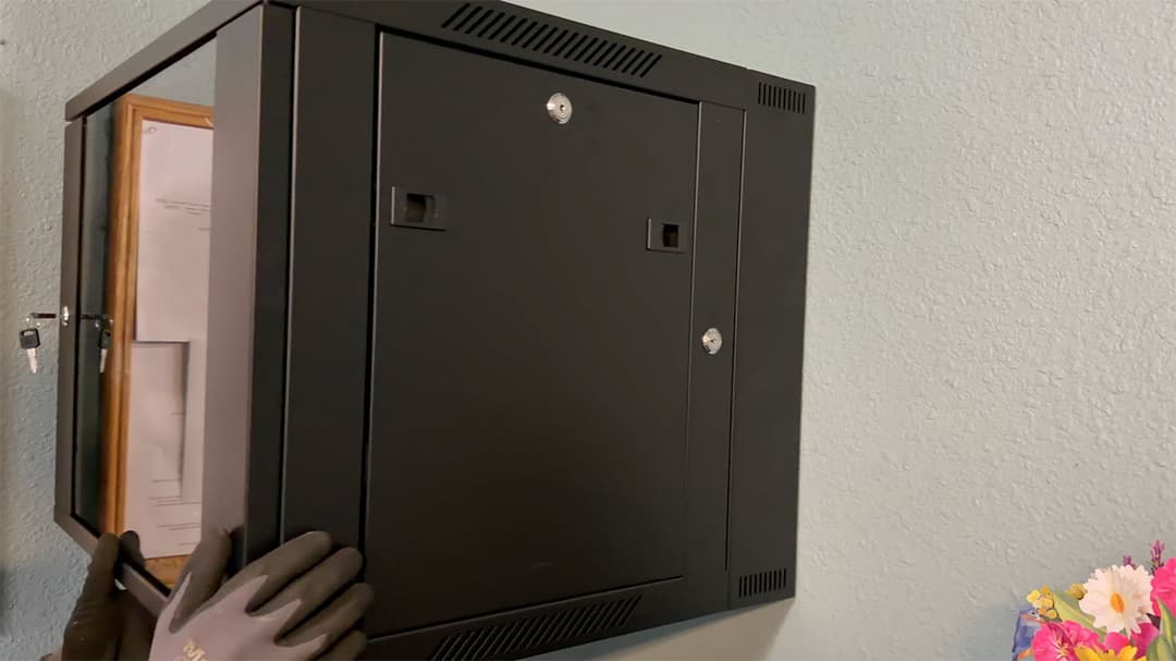 Mounting the new network rack to establish centralized IT management.