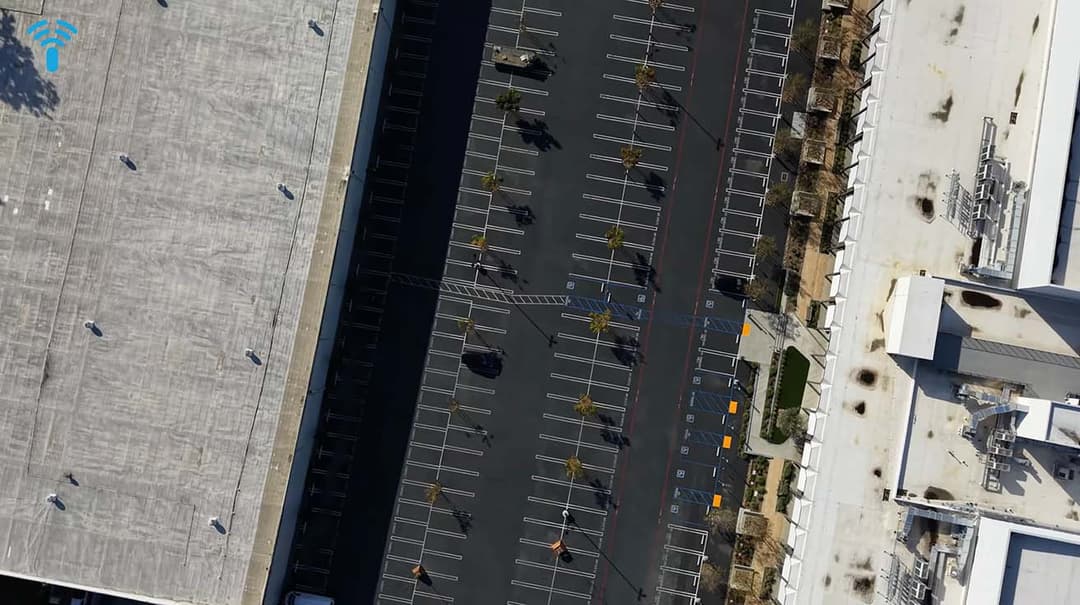 Aerial drone view of an outdoor commercial parking lot