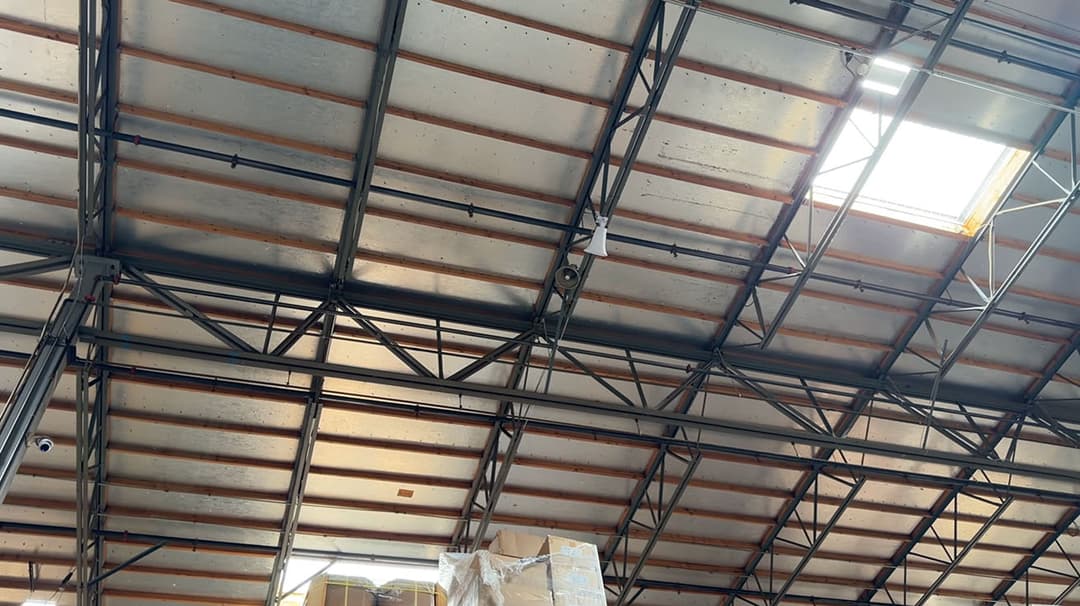 Industrial announcement speaker mounted on ceiling