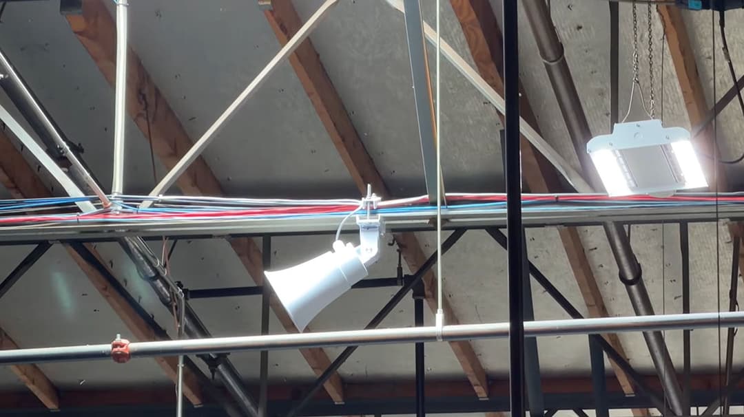 Industrial announcement speaker mounted on ceiling
