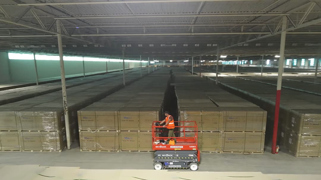 Completed high-ceiling deployment of a UniFi U7 Pro access point in a logistics hub